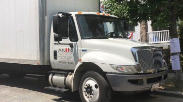 All n 1 Stop Moving and Storage logo