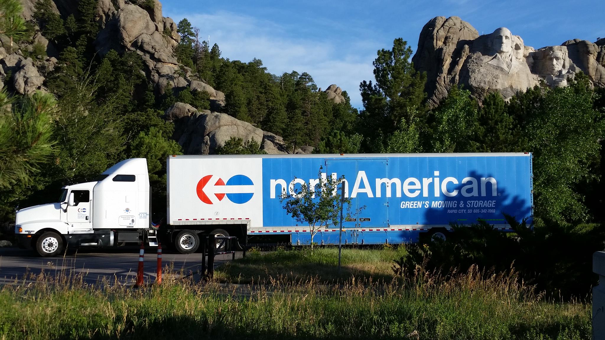 Green's Moving & Storage logo