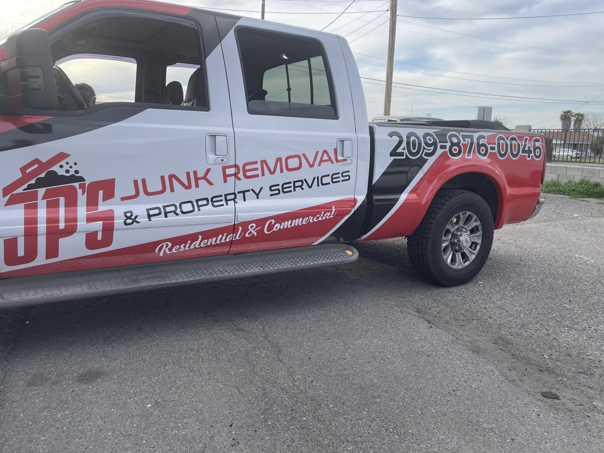 JP's Junk Removal & Property Services logo