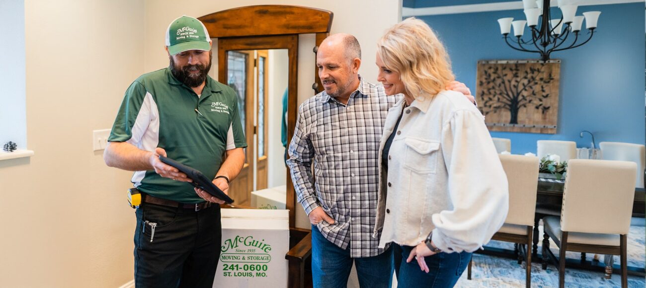 McGuire Moving and Storage logo