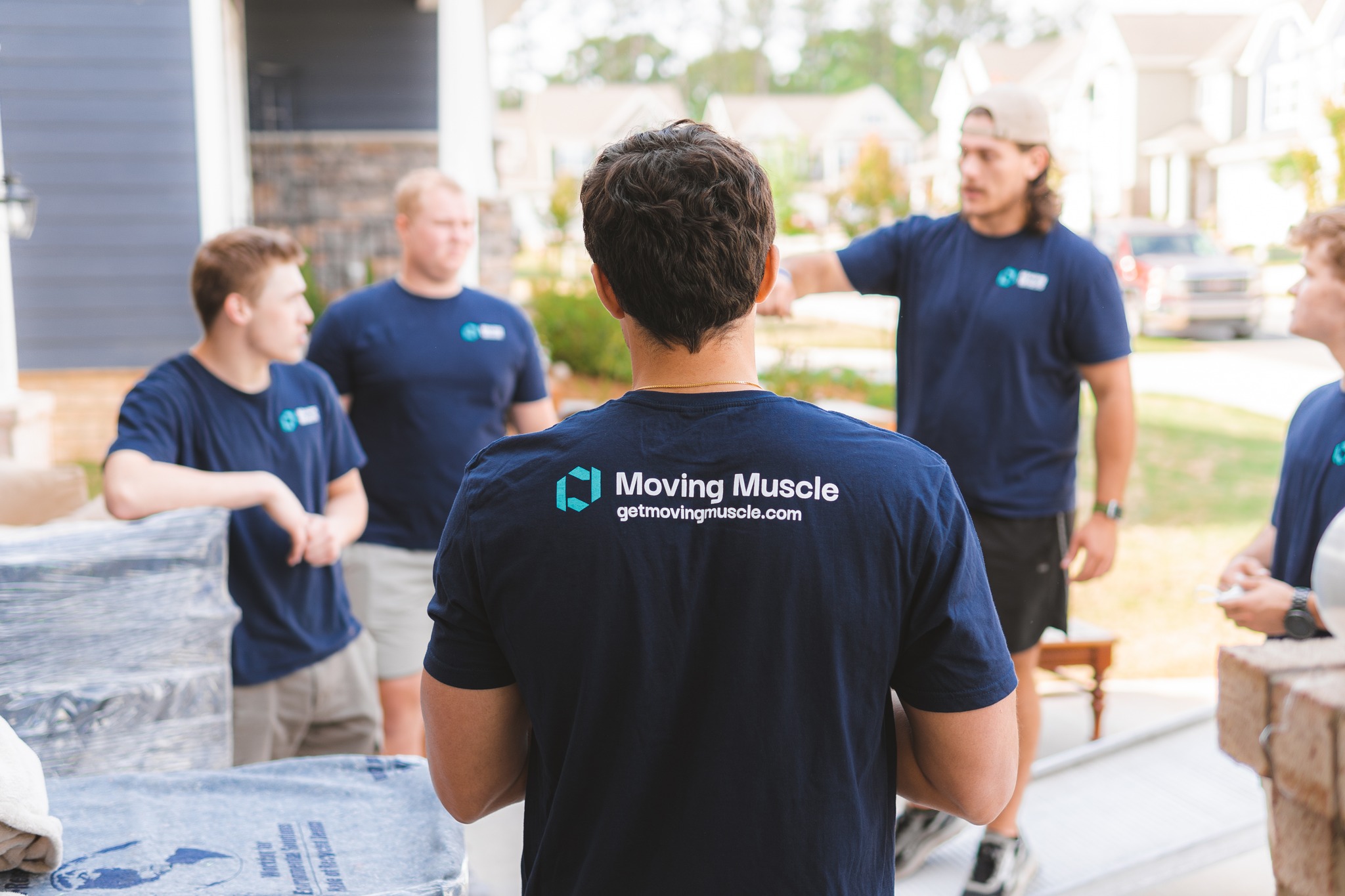 Moving Muscle | Charlotte NC logo