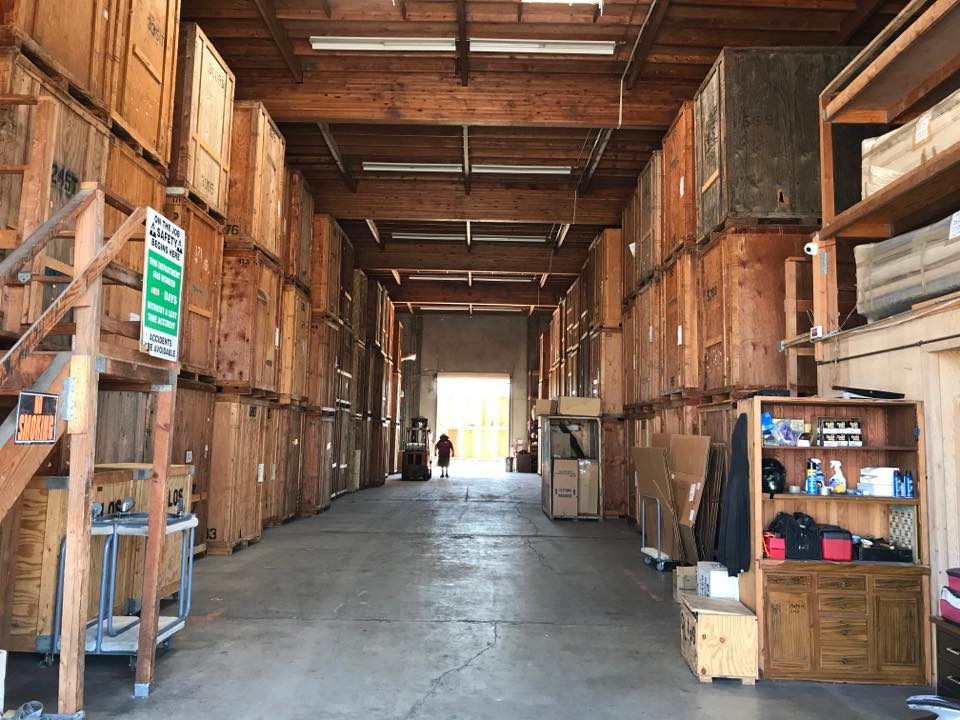 Poulos Moving Systems logo