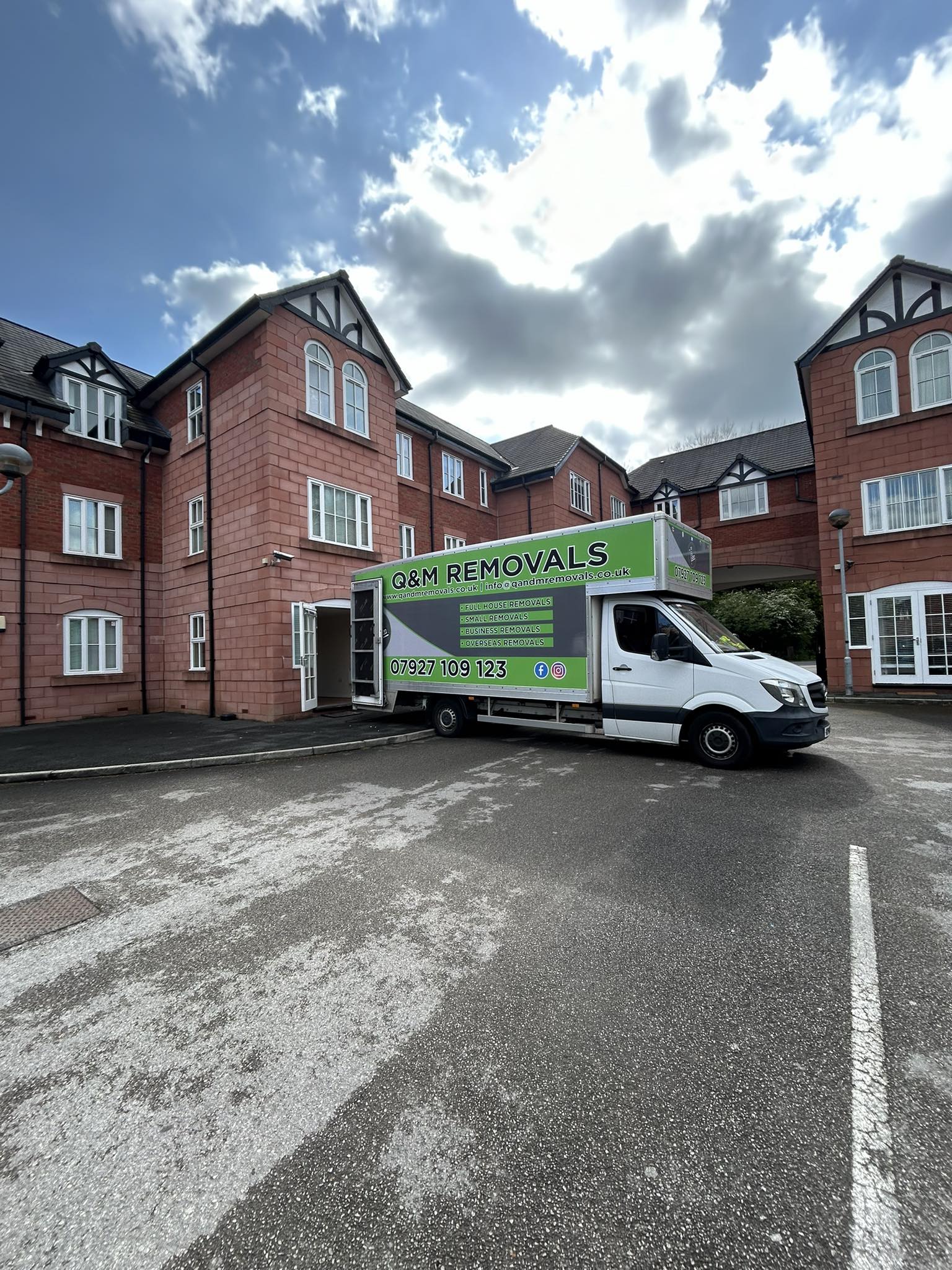 Q and M REMOVALS LIMITED logo