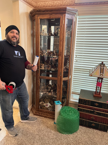 Quality Moving Company logo