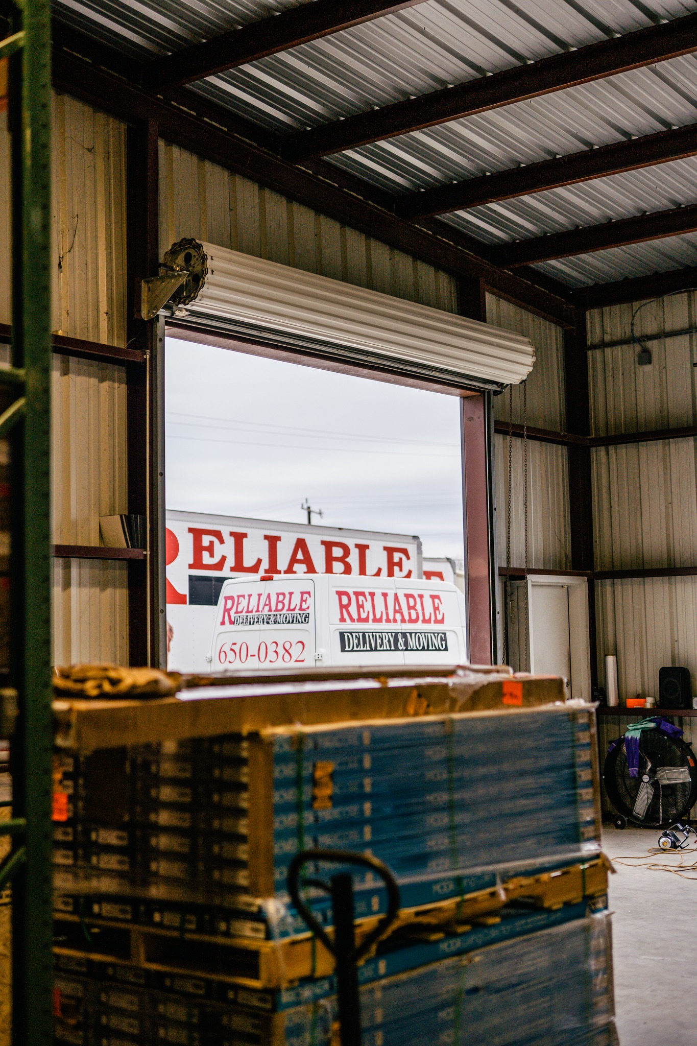 Reliable Delivery & Moving logo