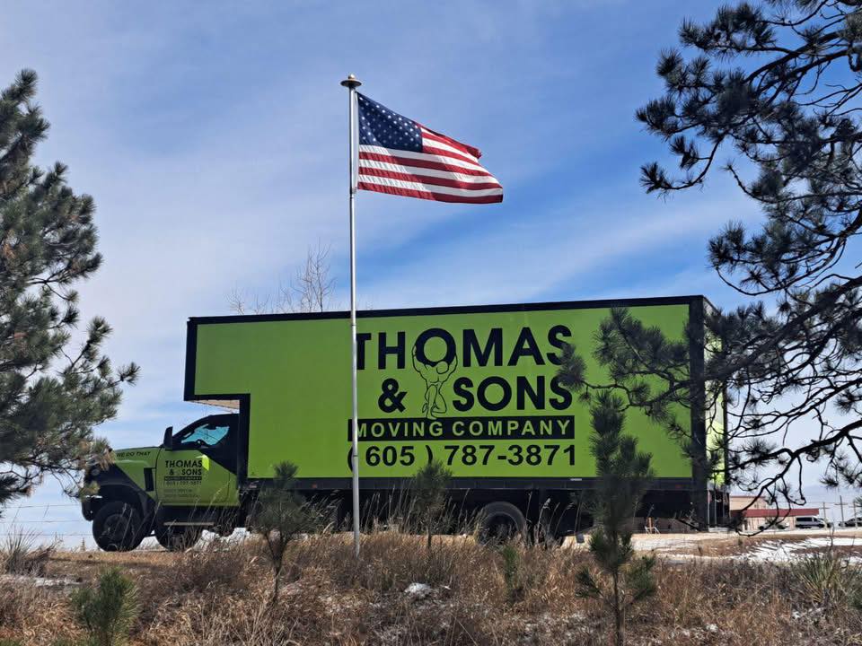 Thomas & Sons Moving Company logo