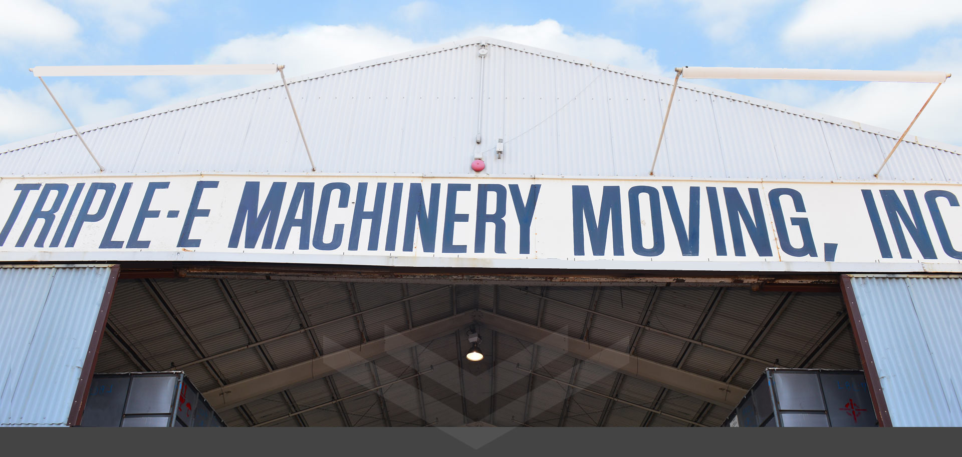 Triple-E Machinery Moving, Inc. logo